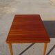 Extendable table, compass legs