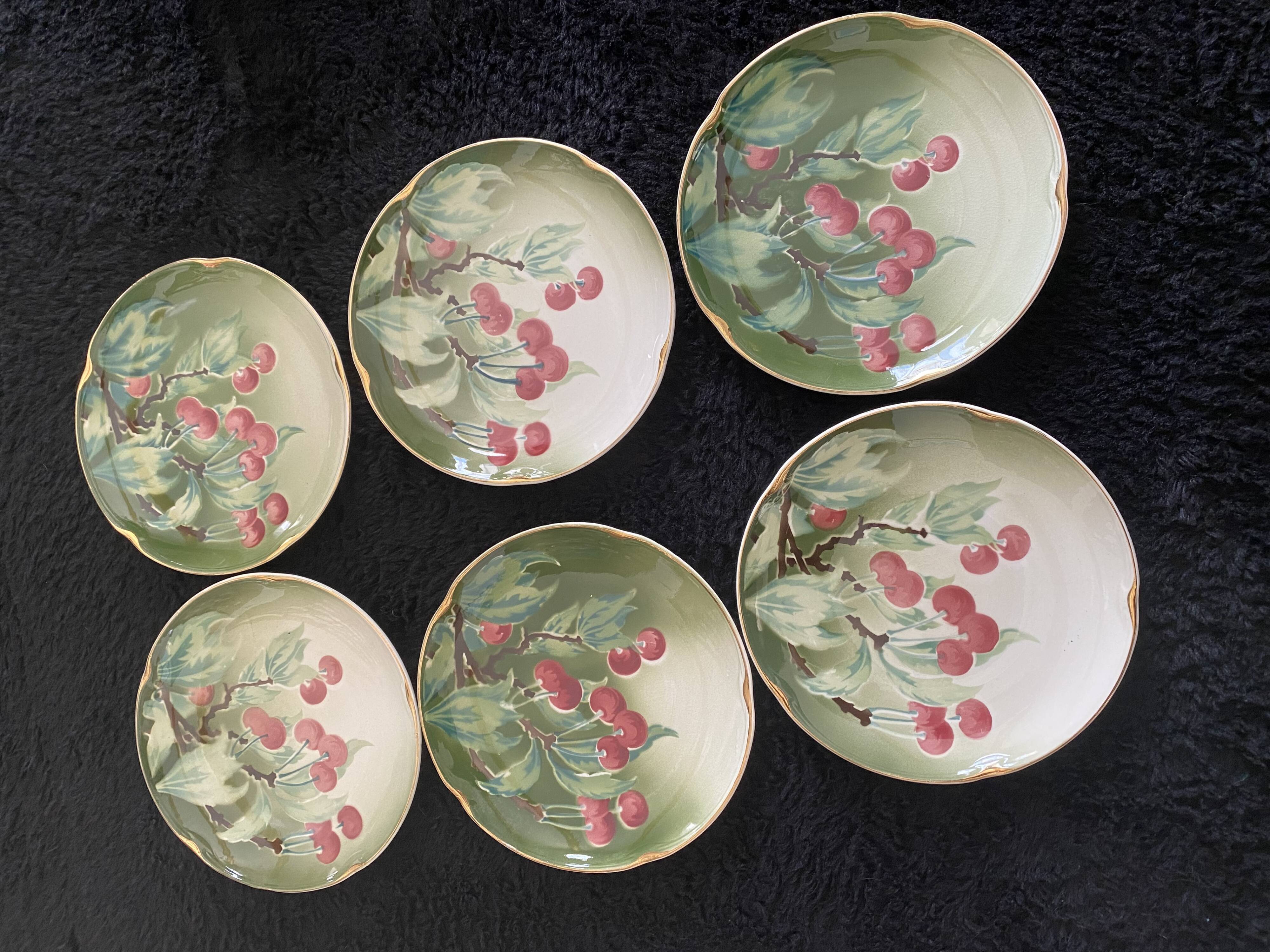 Lunéville cherry plates with golden edges