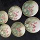 Lunéville cherry plates with golden edges