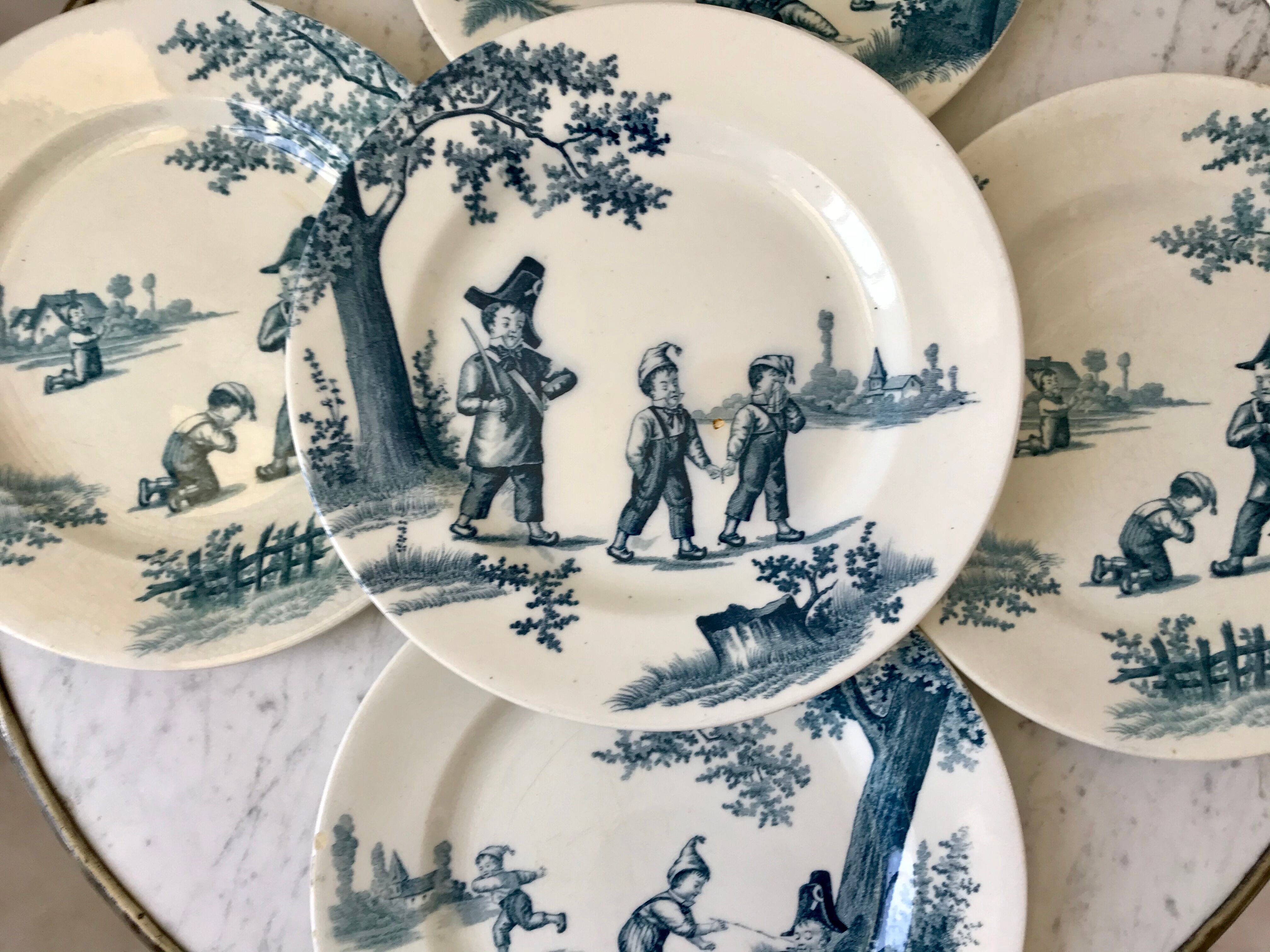 Set of 5 flat plates Iron Earth model "Garde-Champêtre" late nineteenth
