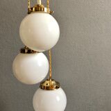 Three-light cascade suspension, vintage globes in white opaline