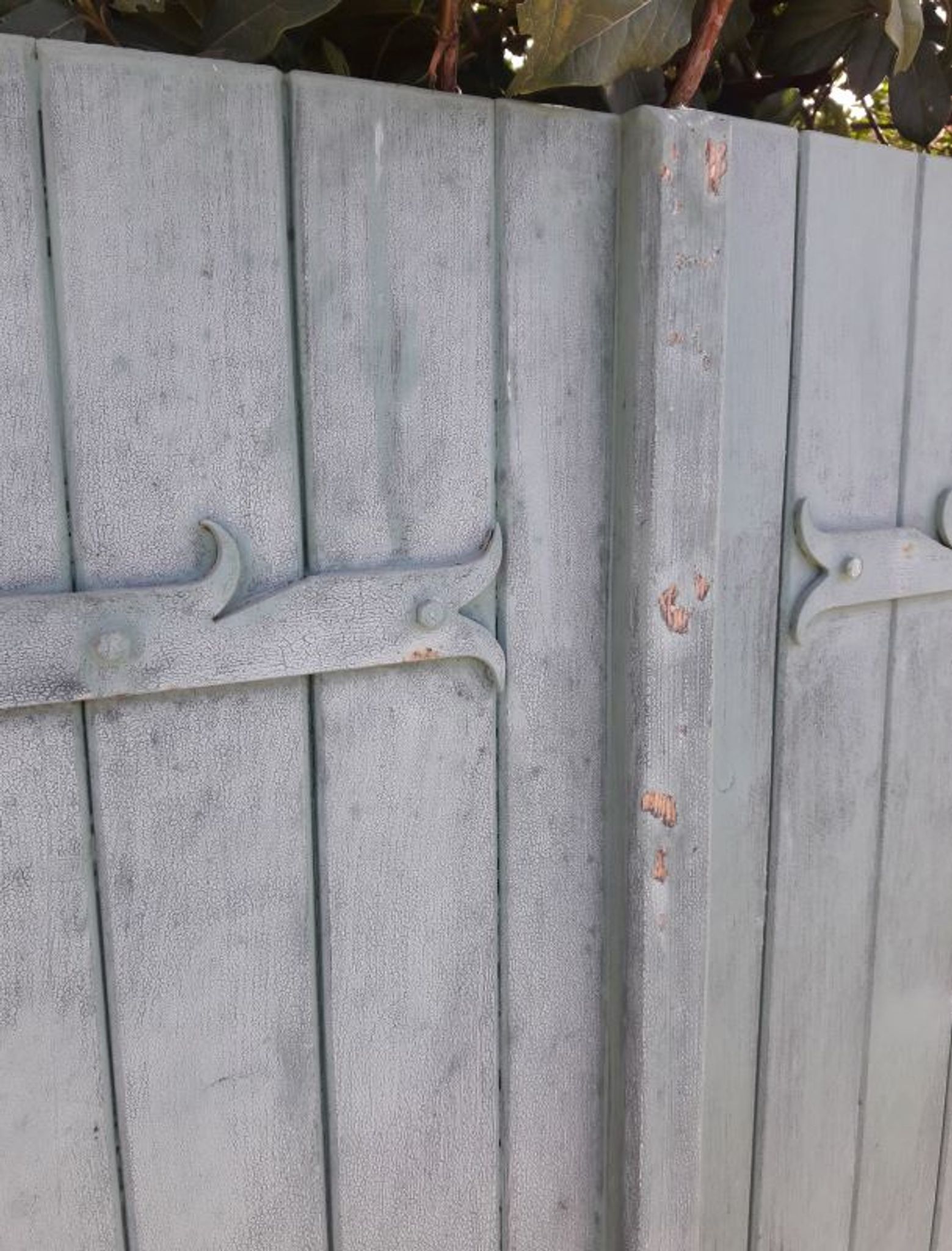 Pair of wooden iron hanging shutters