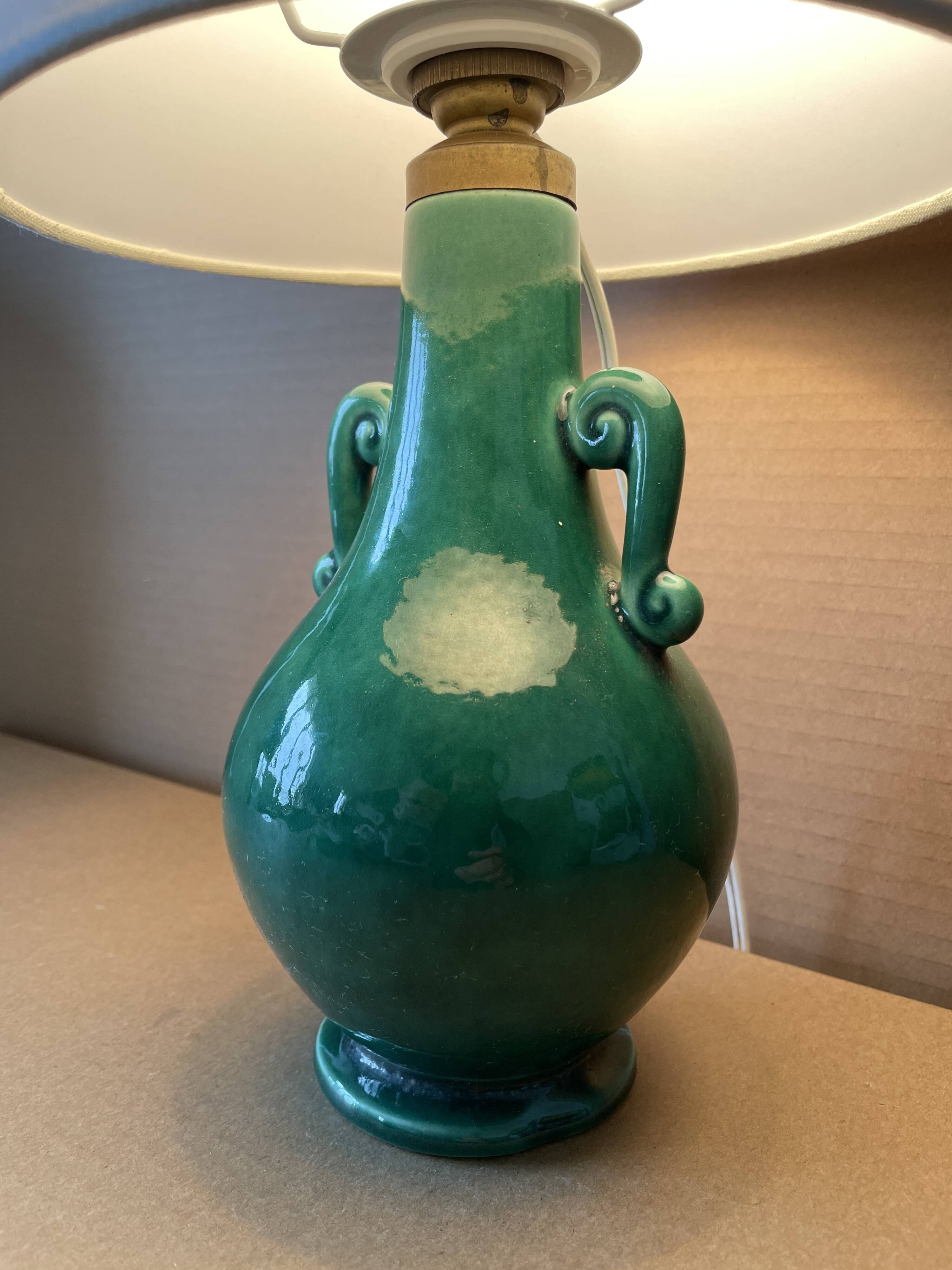 Old green ceramic lamp