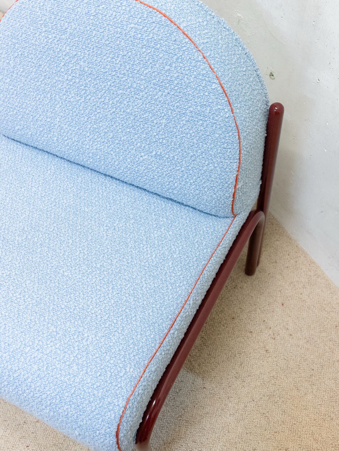 Souvignet armchair reupholstered in sky blue boucle.