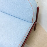 Souvignet armchair reupholstered in sky blue boucle.