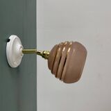 Vintage globe wall light in frosted pink and gold glass.