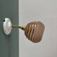 Vintage globe wall light in frosted pink and gold glass.