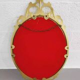 Miroir ovale italien de type médaillon en laiton