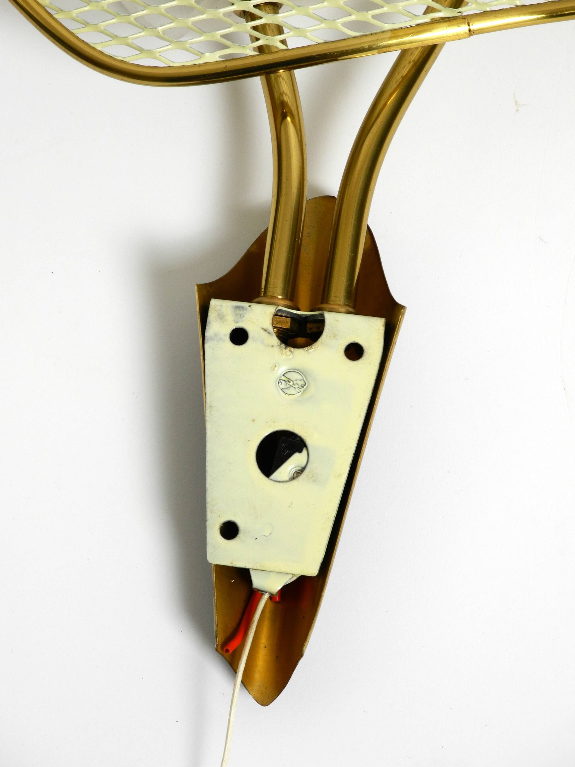 Pair of Mid Century expanded metal wall lamps still new and never connected