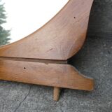 Miroir rond sur meuble 60's