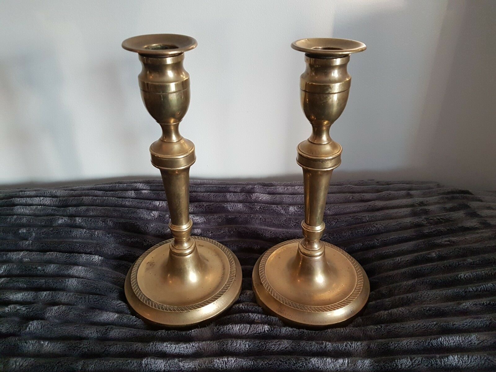 Pair of bronze church candlesticks