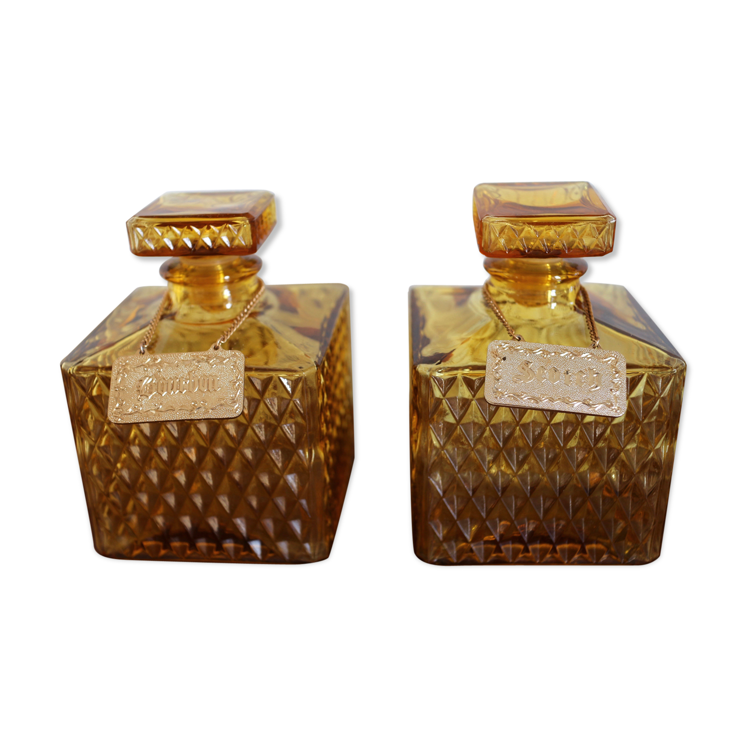 2 yellow glass whiskey carafes