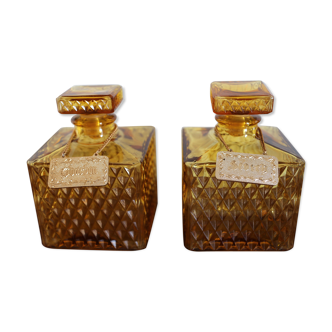 2 yellow glass whiskey carafes