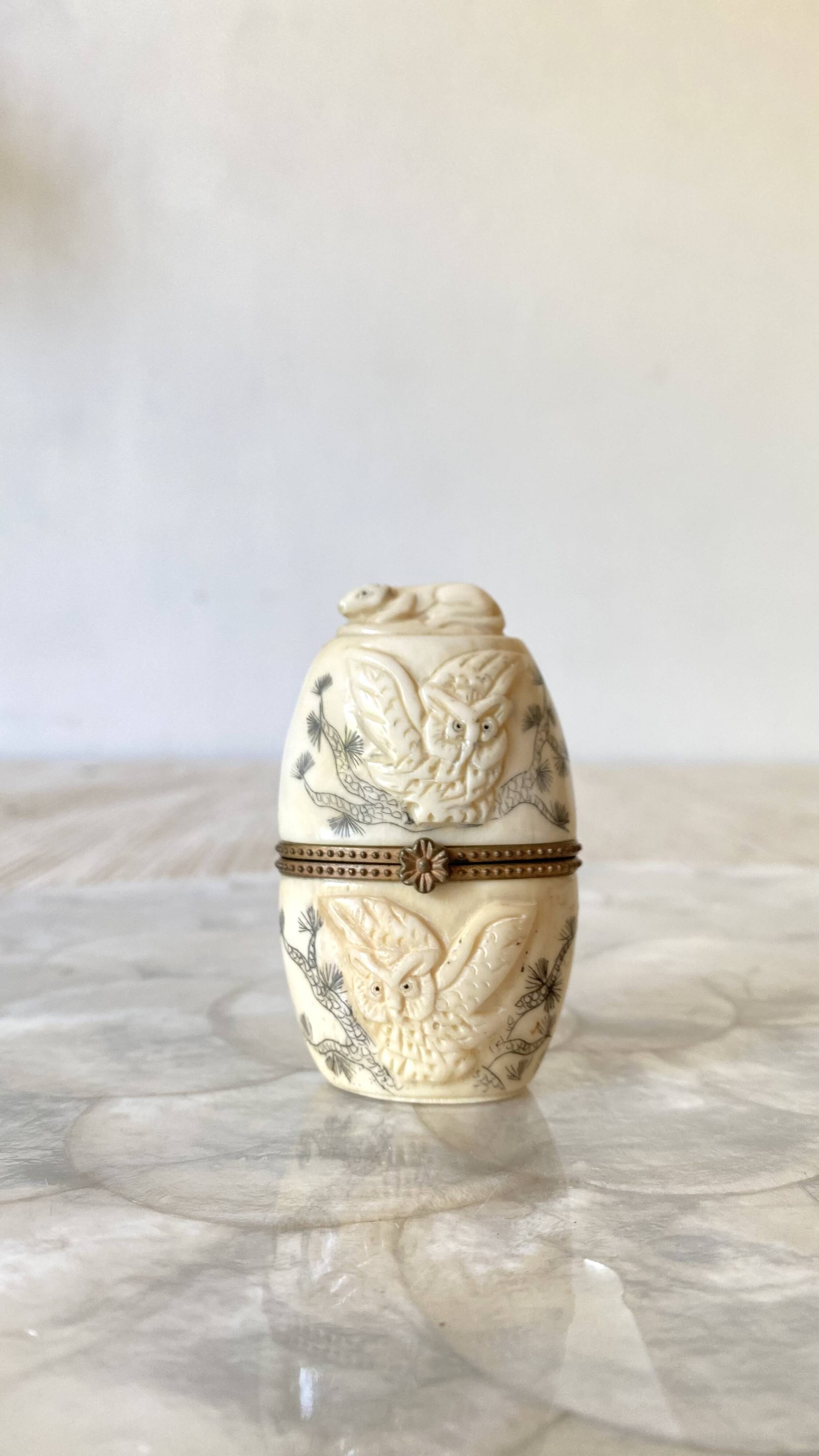 Ivory and brass owl and ermine box