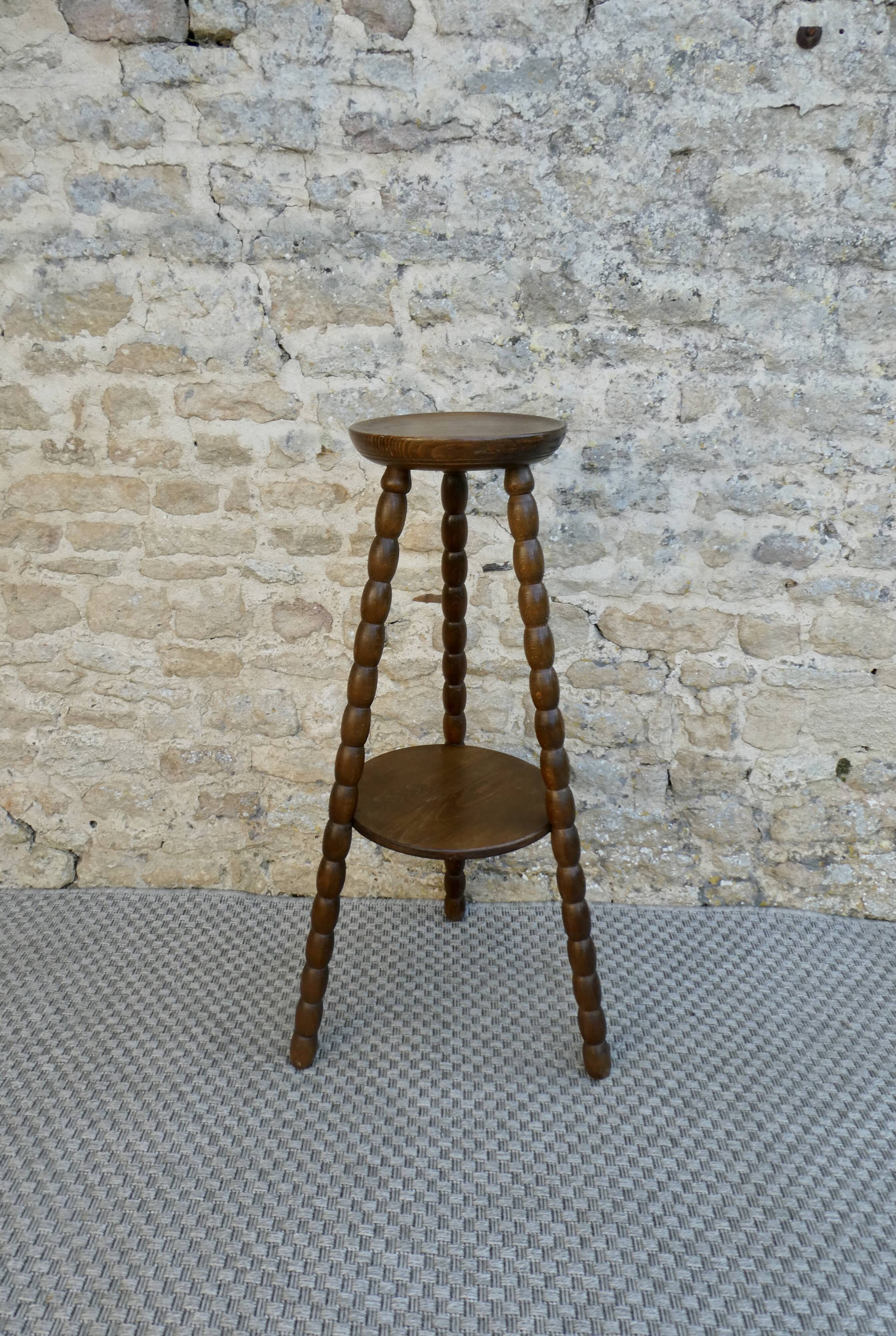 Turned wooden tripod stand