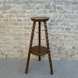 Turned wooden tripod stand