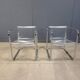 Paire de fauteuils en plexiglas et chrome tubulaire, années 1970