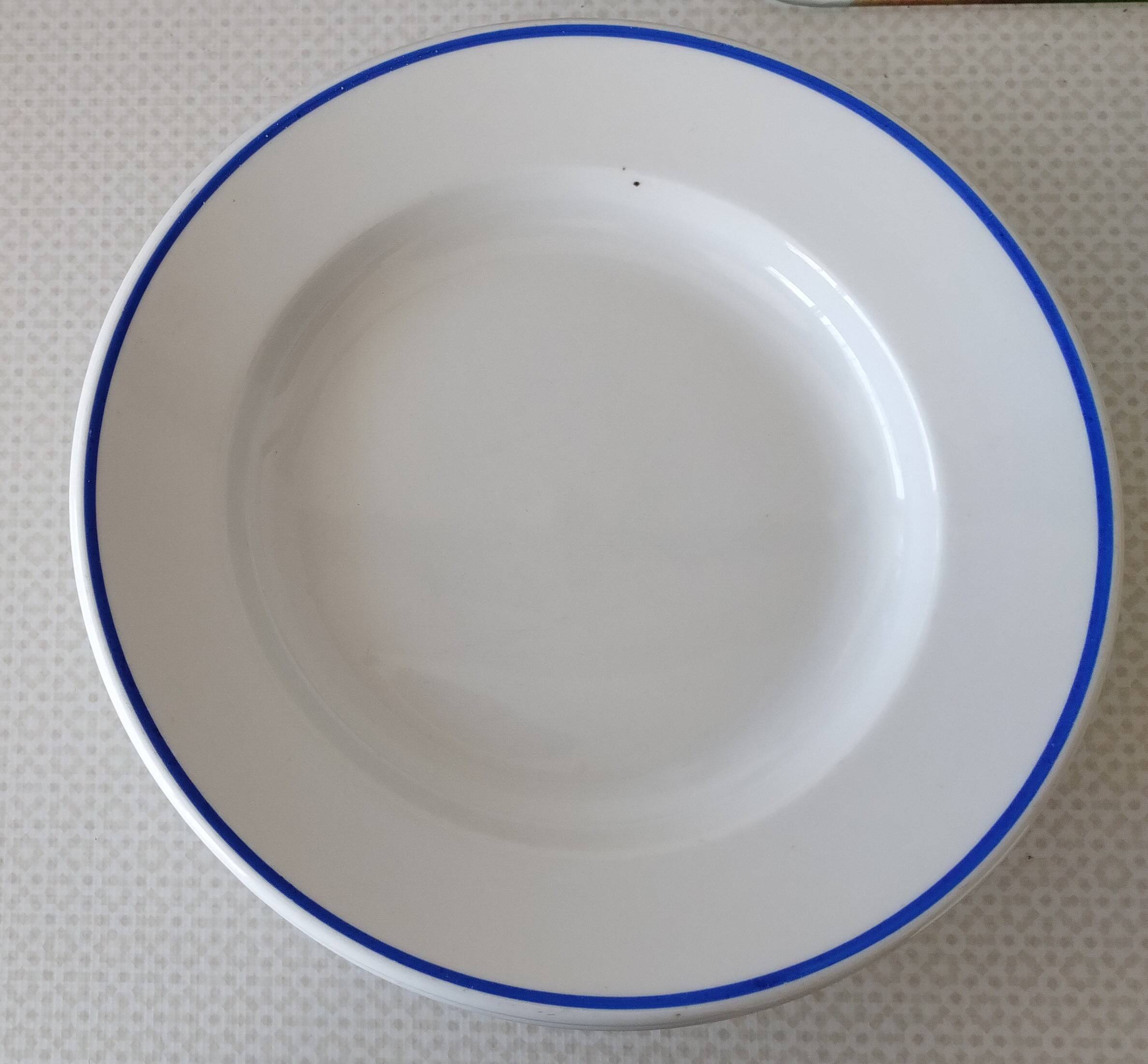 3 Pillivuyt white porcelain dinner plates with blue edging.