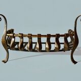 Old cast iron and brass log holder