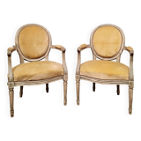 Pair of Louis XVI style medallion armchairs