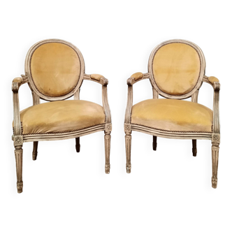 Pair of Louis XVI style medallion armchairs