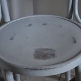 Pair of Lichtig bistro chairs in painted grey beech, pressed seat, circa 1900.