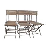 Chairs of wrought iron and wood white