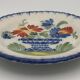 Assiette ancienne en faïence d’auvillar à décor de corbeille de fleurs polychrome