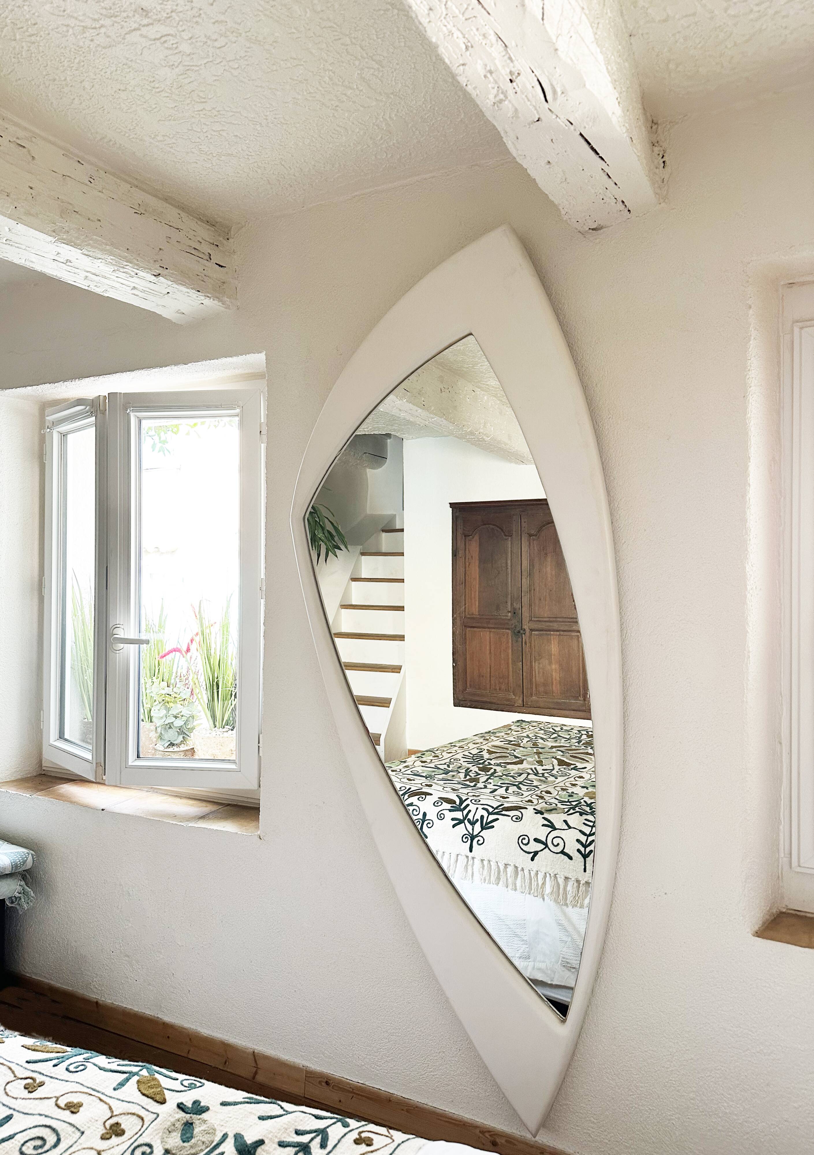 Dismantled Space Age XXL wall mirror in lacquered wood. France, 1970s.