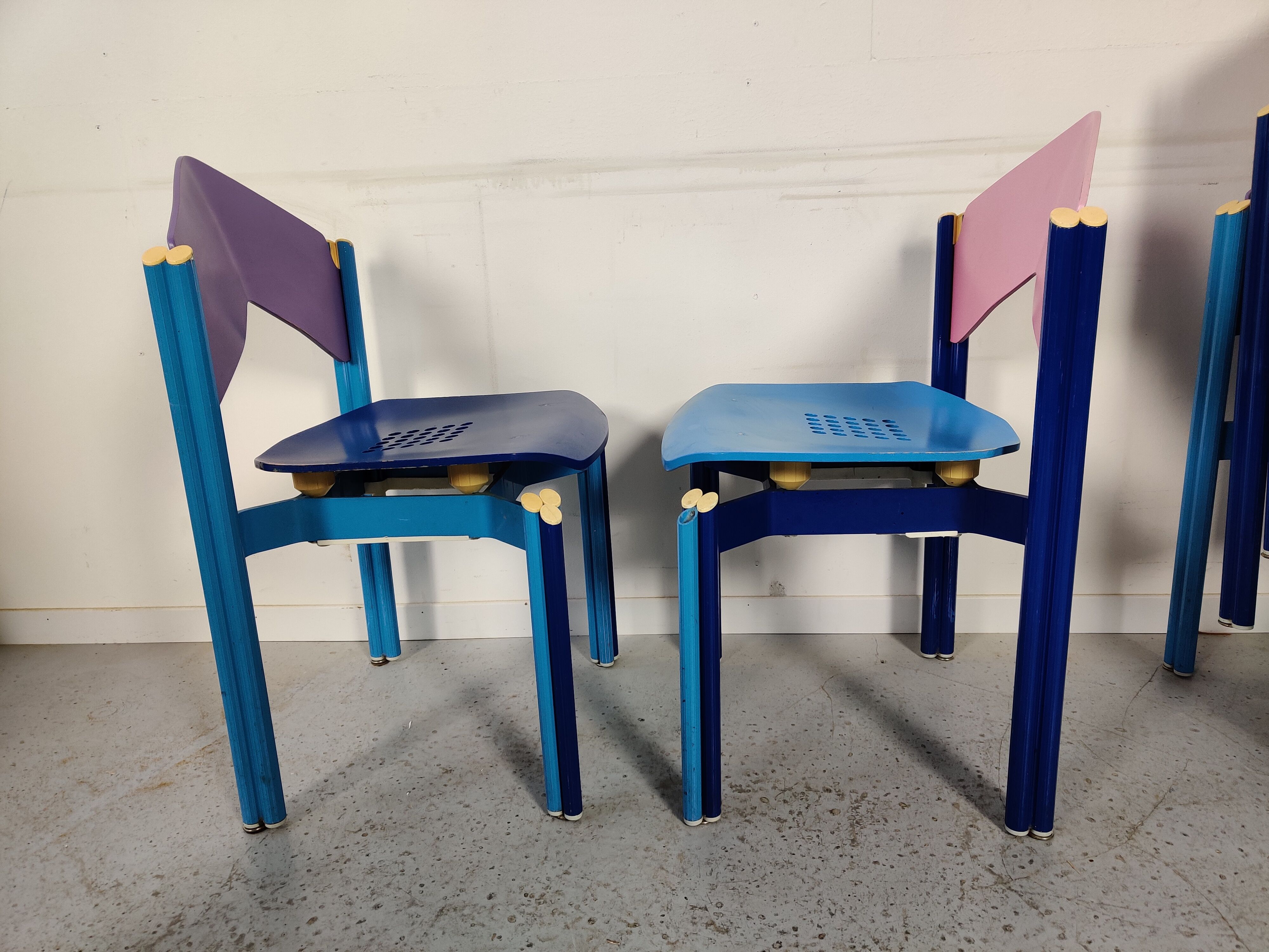 12 multicolored chairs wood and metal, 80s