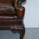 Chesterfield leather canapé in Georgian style with lion paw carved feet.