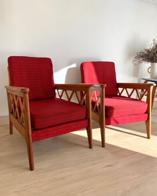 Pair of vintage wooden armchairs with braces