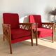 Pair of vintage wooden armchairs with braces