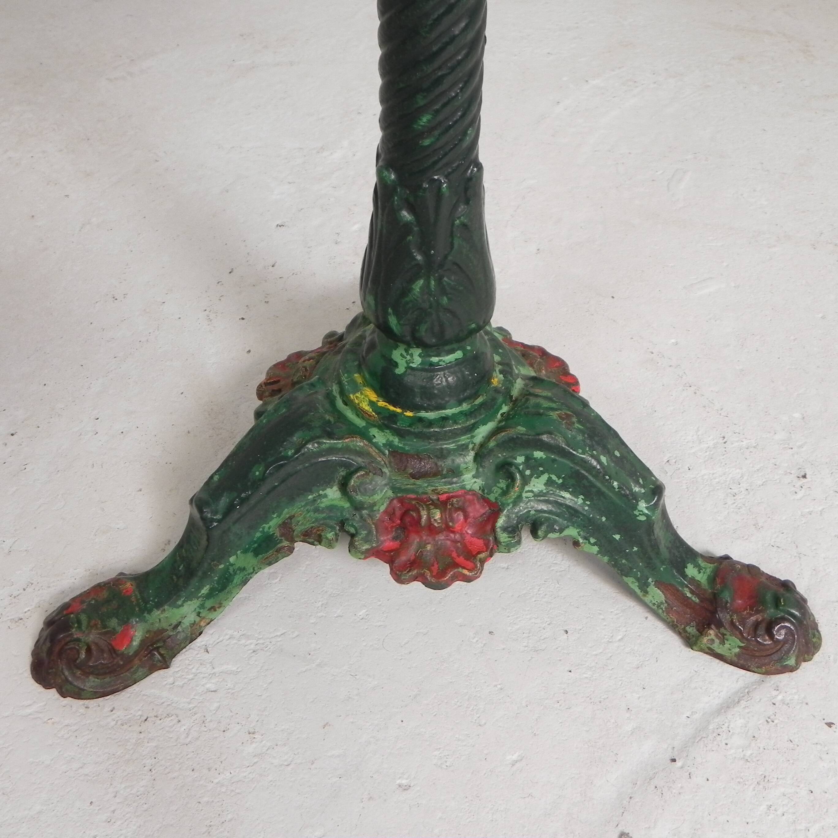 Bistro table with cast iron legs and marble top, 1920s.
