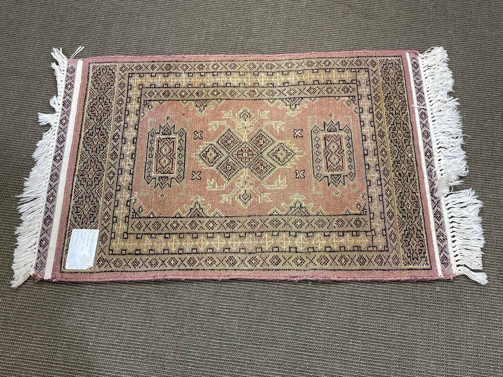 Small handmade Pakistani wool rug - 88x64cm