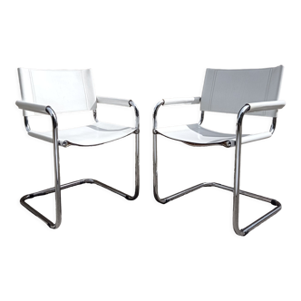Pair of armchairs in white leather and chrome 70s