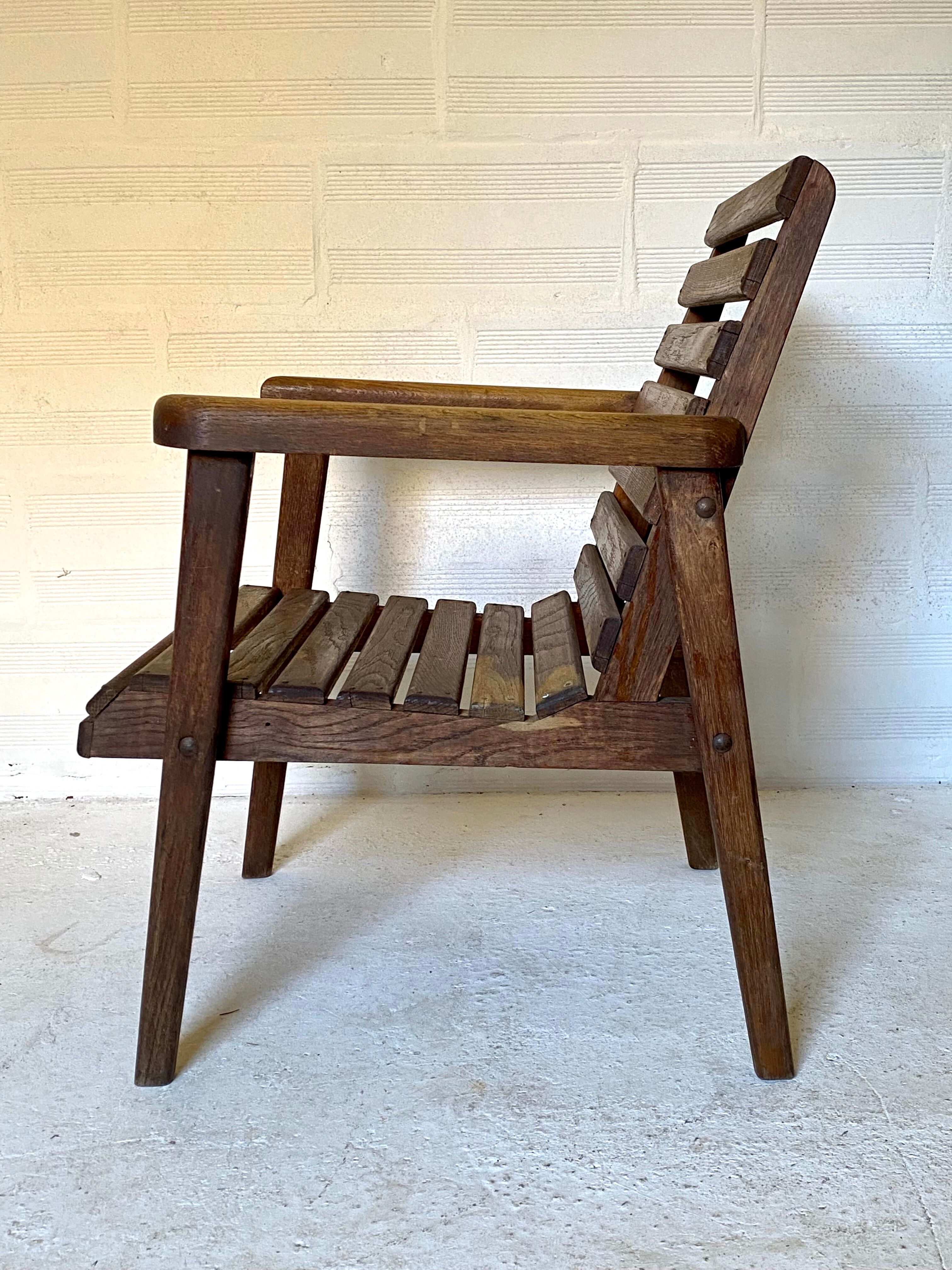 pair of armchairs with slats in chene 1950