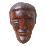 Wooden sculpture ethnic man's head handcrafted tribal decorative object workshop
