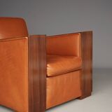 Paire de fauteuils Art Déco en cuir. Années 40.