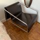 Wood and metal design armchair