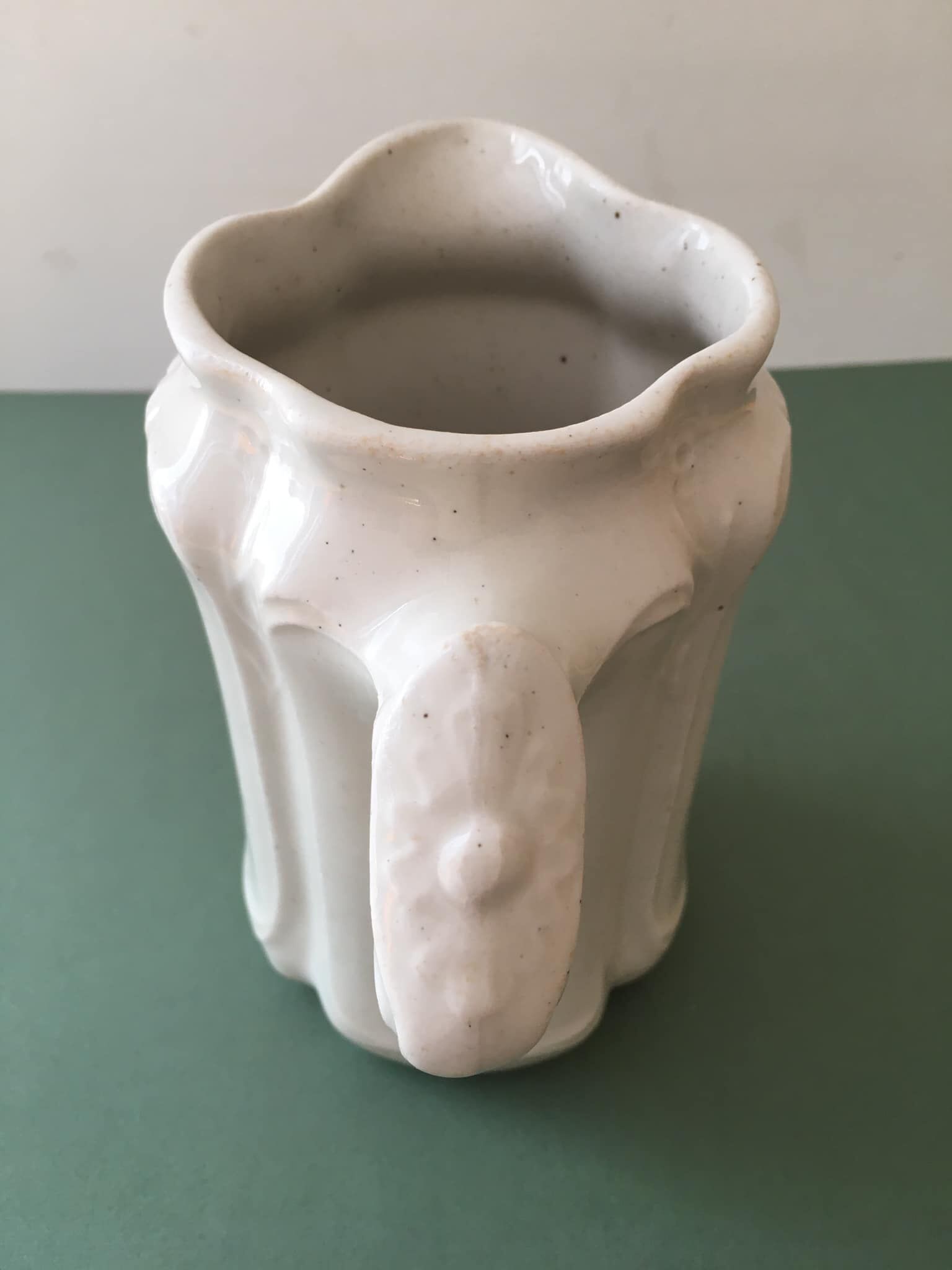 Antique ivory-coloured porcelain vase/pitcher