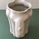 Antique ivory-coloured porcelain vase/pitcher