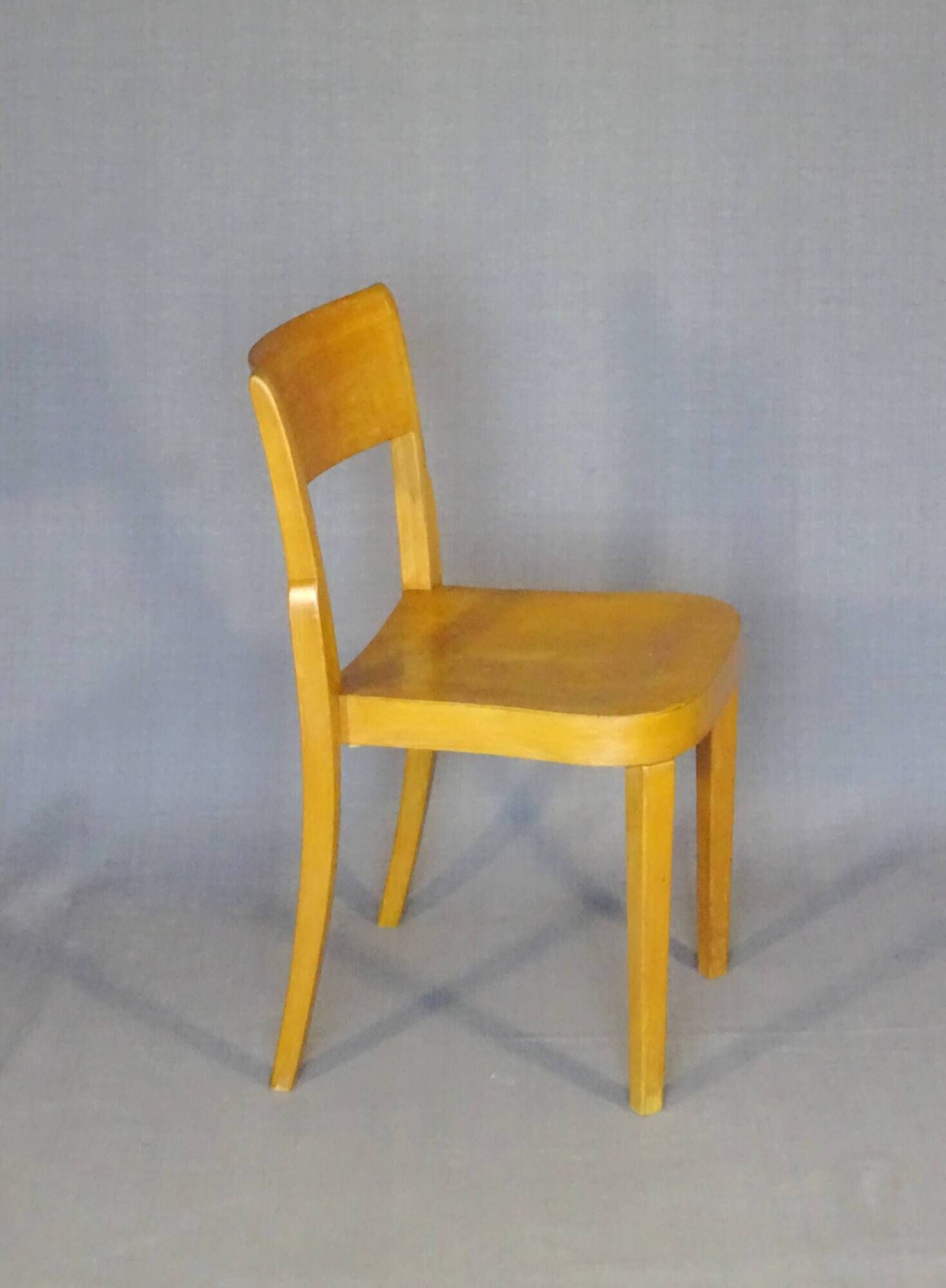 4 bistro chairs, around 1960, by Horgen Glarus - Switzerland - golden oak finish.