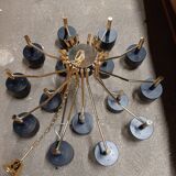Black chandelier and gilded metal