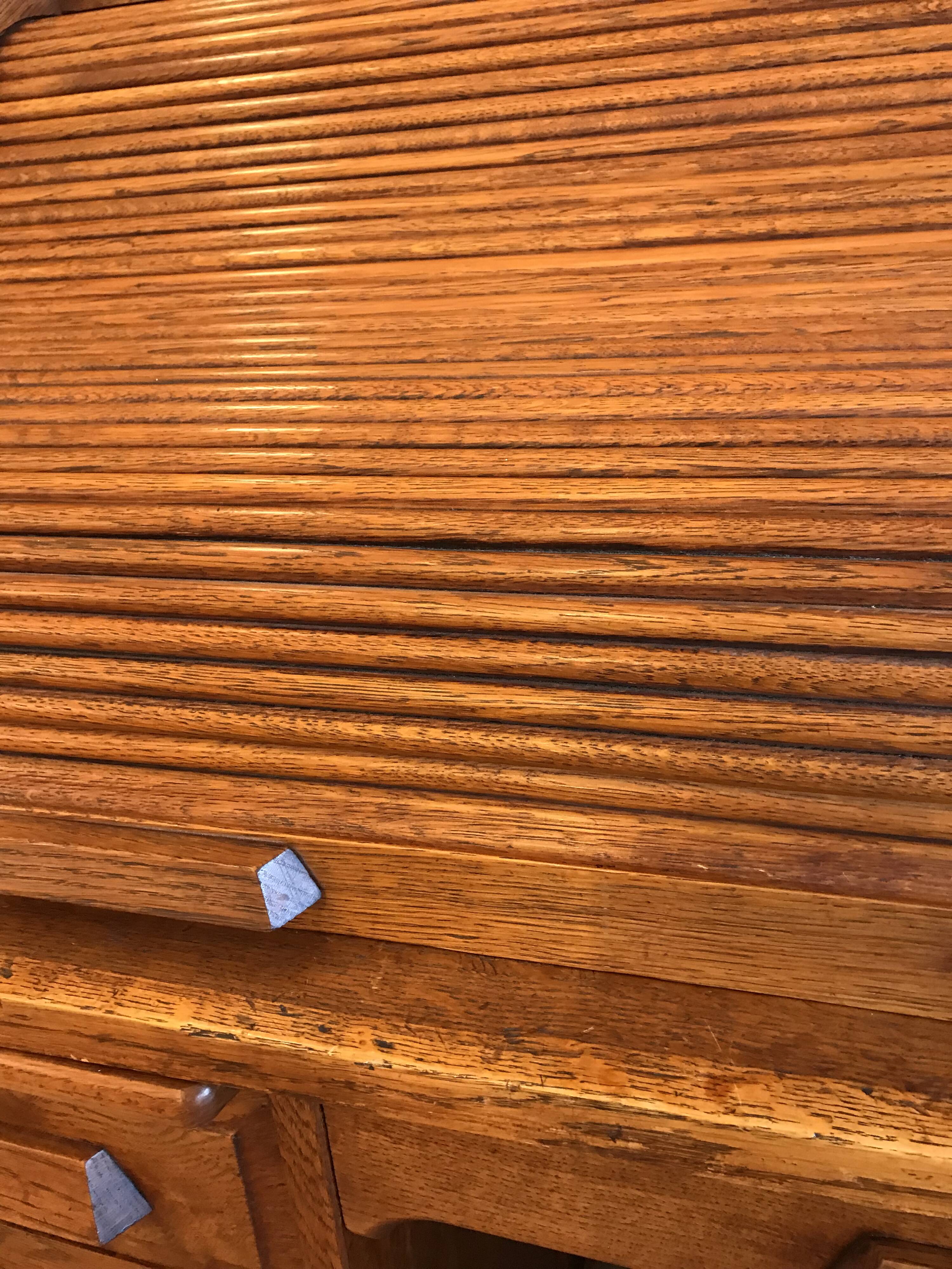 American desk with sliding shutter in solid oak, 20th century