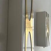 Pair of Loewy wall lights for Hilton, brass and Perspex, France 1965