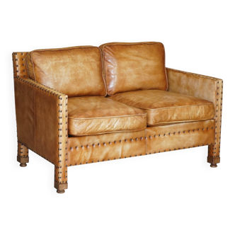 Two-seater leather canapé, hand-tanned, Edwardian style with studs.