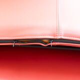 Armchair and pouf in red leather, Vitelli and Ammannati, for Brunati 70/80