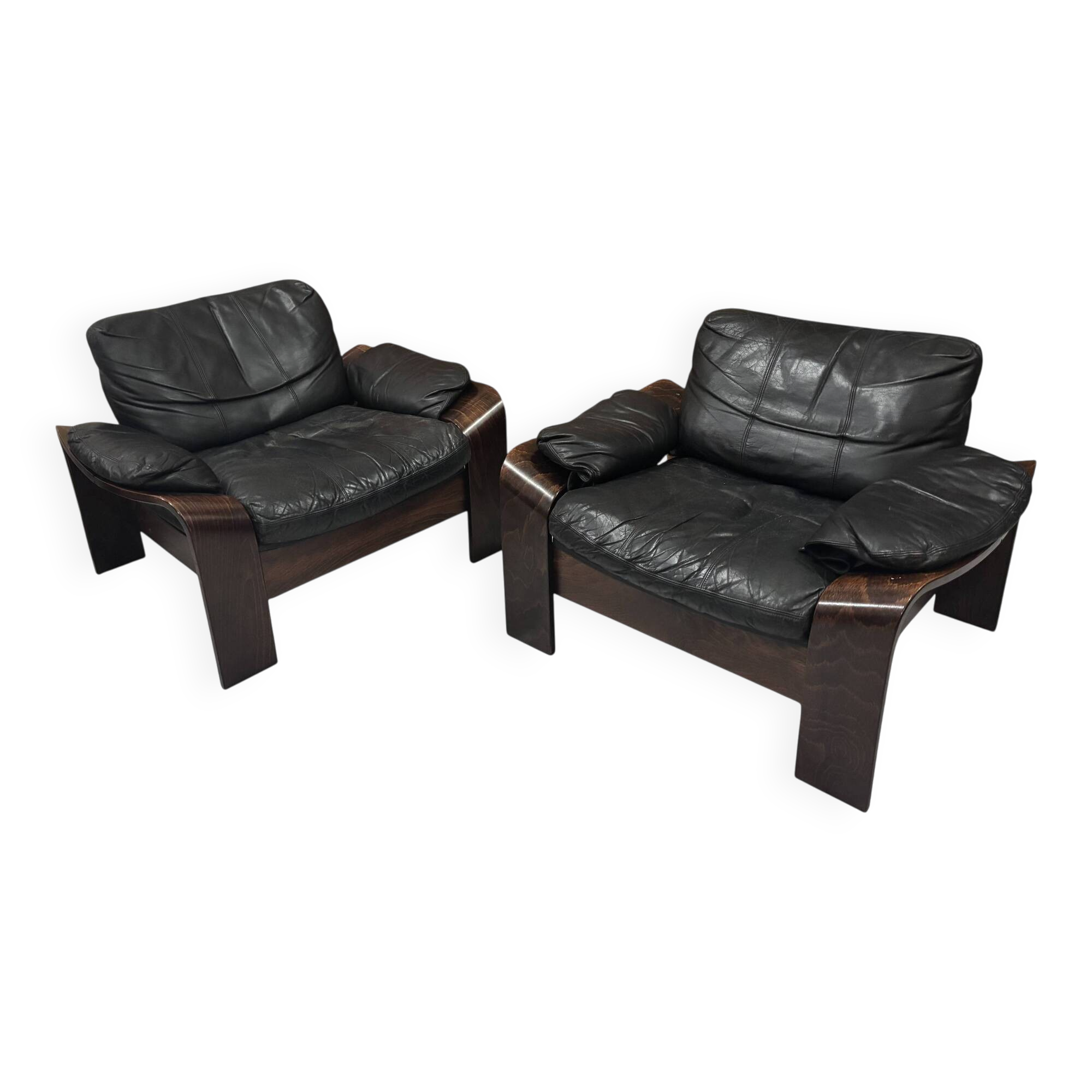 Pair of Scandinavian armchairs in leather and rosewood.