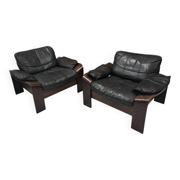 Paire de fauteuils scandinaves en cuir et palissandre